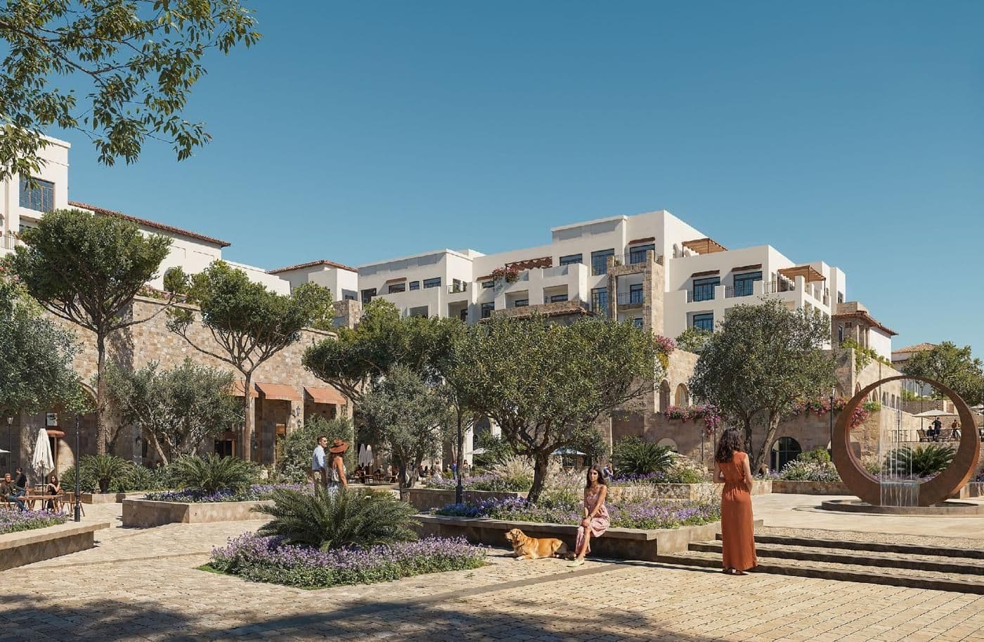 Yemm Boulevard apartments above a tree-lined plaza