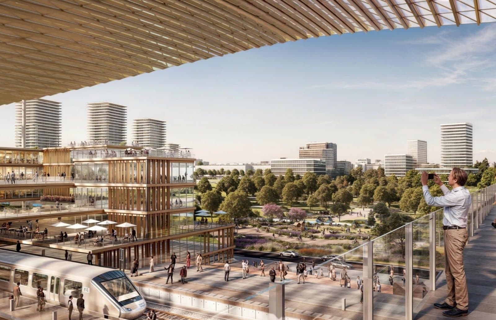 Render of the business district with offices, a transit line and a public promenade
