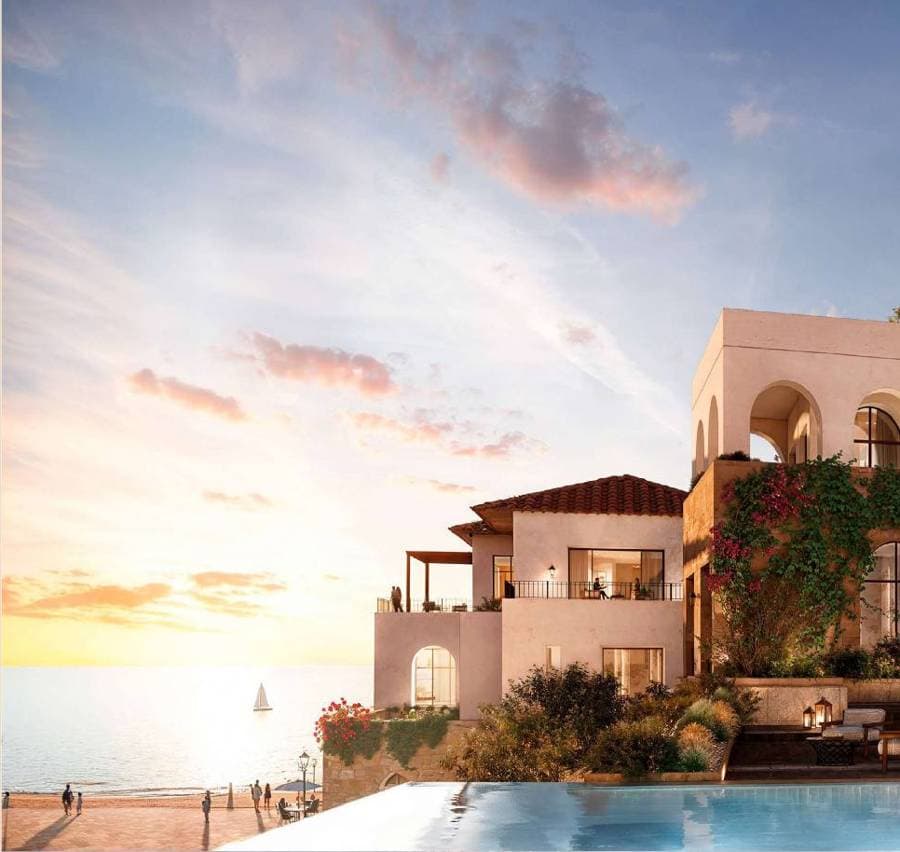 Yemm Beach Plaza apartments above the beach at sunset