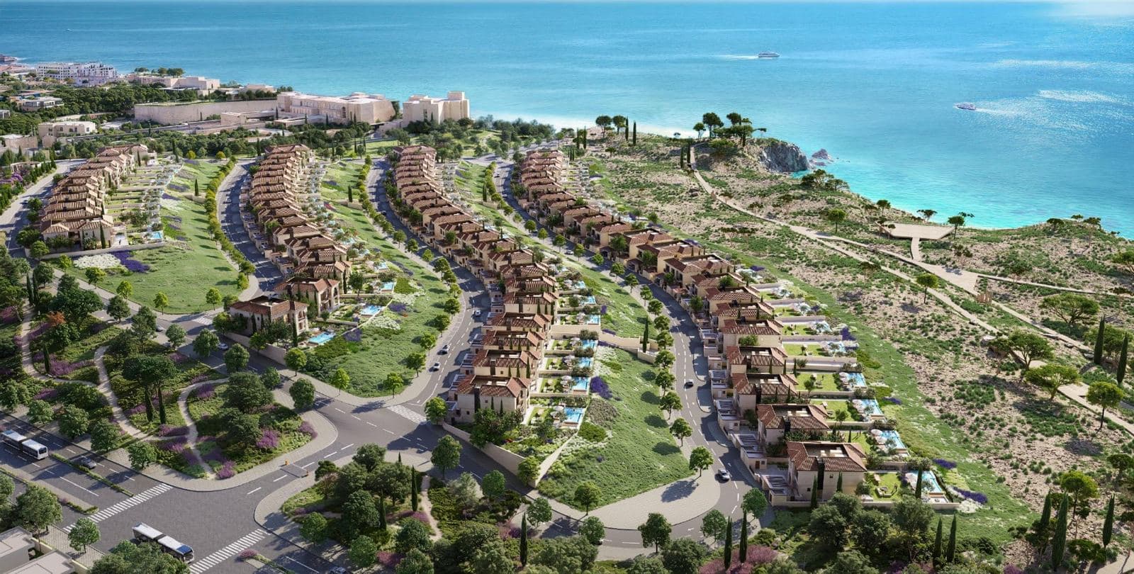 Aerial view of Yemm Views villas stepping down the hillside to the sea